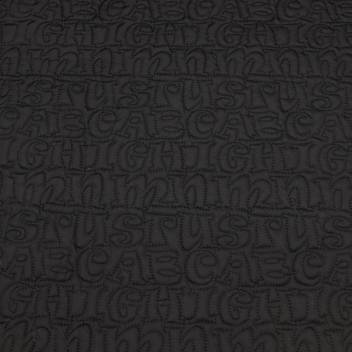 Ткань курточная стеганая шир.135см, цв.черный стежка буквами 